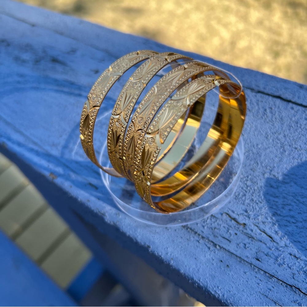 Bangles set in gold colour